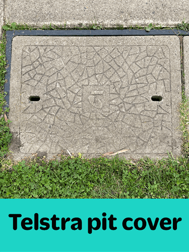 Example of a Telstra pit cover