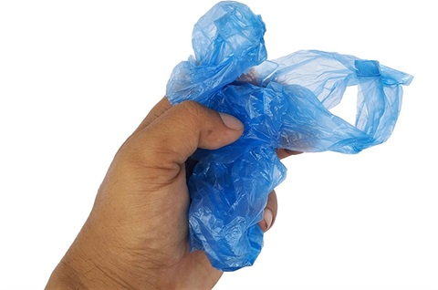 Waste - hand holding plastic bag.jpg